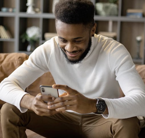 A man texting on his mobile phone